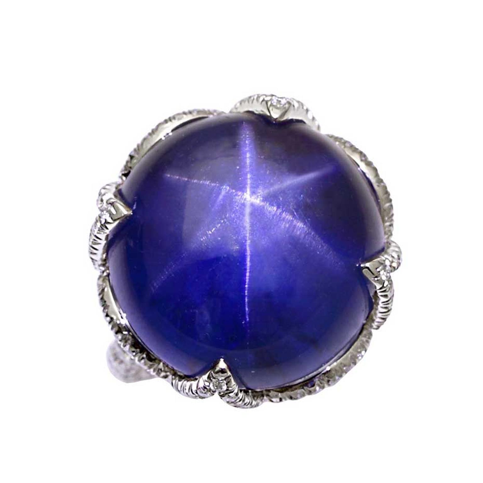 Natural star sapphire lotus ring in platinum with diamonds. Available at 1stdibs.com.