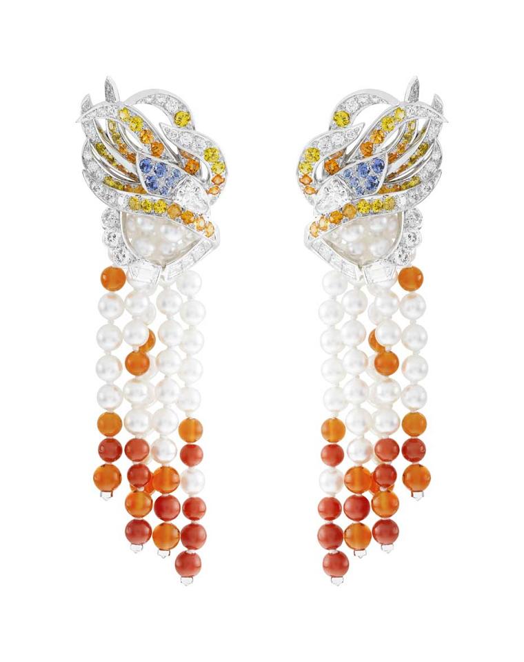The stunning Oiseau de Feu earrings from the Palais de la Chance collection by Van Cleef & Arpels worn by Viola Davis, featuring diamonds, spessartite garnets, fire opal, red coral, white cultured pearls, blue and yellow sapphires set in white gold.