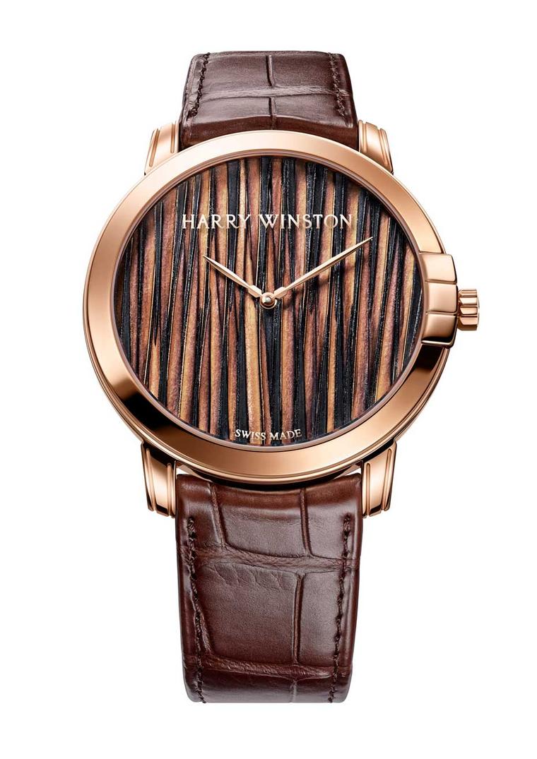 Harry Winston Midnight Feathers Automatic watch simulates a textured fabric on the dial alternating dark and light brown feathers to impart a dynamic rhythm to the dial.
