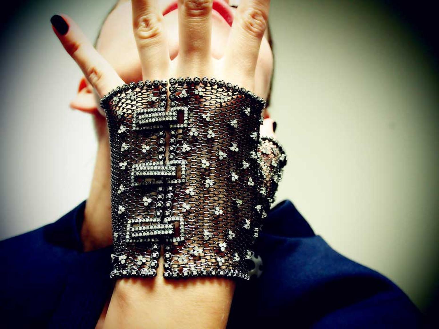 Geraldine Carfield Feu et Chaines diamond mesh half glove with diamonds set in a fine weave of black silver (£2,709).