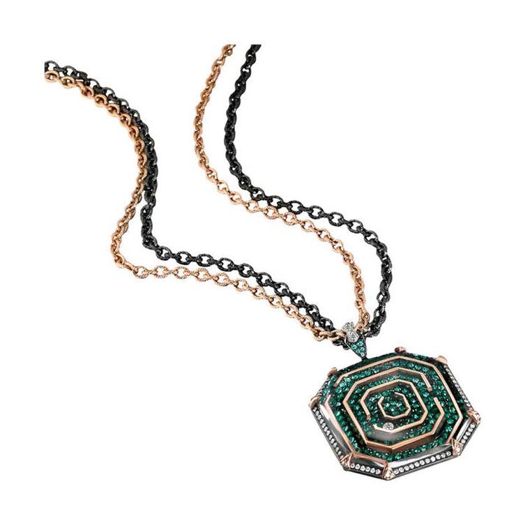 Zaiken for Gemfields necklace in yellow gold and blackened silver, set with Zambian emeralds and a diamond that the wearer can navigate through the maze.