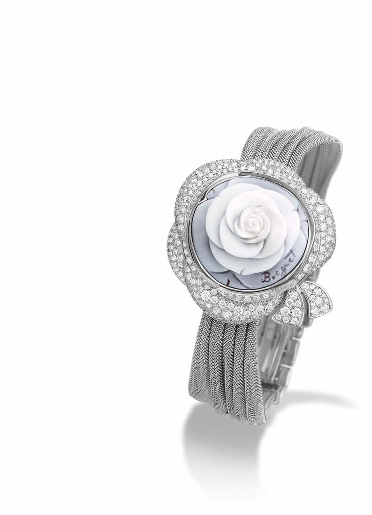 Breguet Rose de la Reine secret watch features a beautiful cameo rose carved from shell as a cover. The rose was recreated from a 1783 painting of Queen Marie Antoinette of France.
