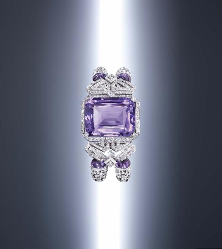 Cartier Purple high jewellery secret watch marries a marvellous, cushion-shaped amethyst of 62.84 carats with a geometric, Art Deco frame punctuated with diamonds.