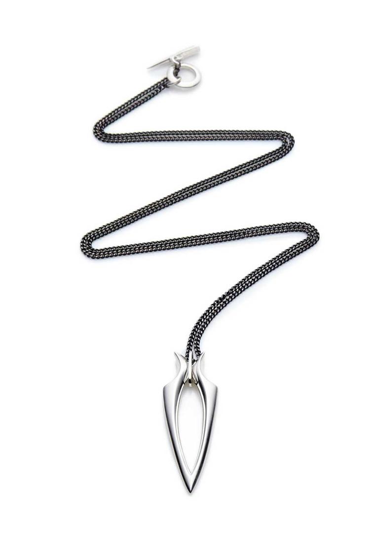 Hannah Martin Spur pendant in silver on a black chain.