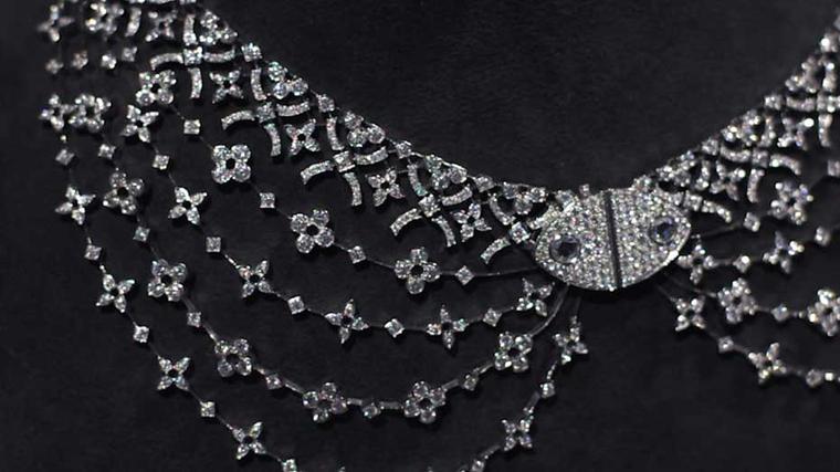Louis Vuitton's Dentelle de Monogram neckalce mimics the star and flower shapes of the original pattern.