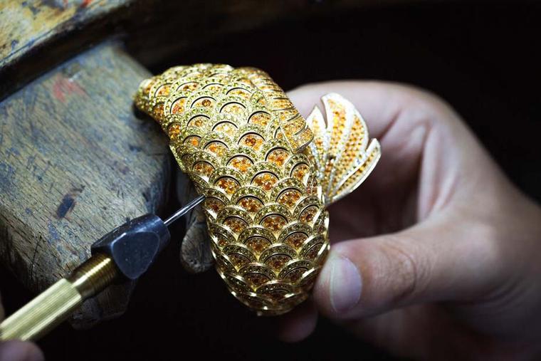 Van Cleef & Arpels Carpe Koï high jewellery watch required the dedicated skills of the maison's famous Mains d'Or (golden hands or jewellery artisans) to create the beautiful gold structure, which was then gem-set, stone by stone.