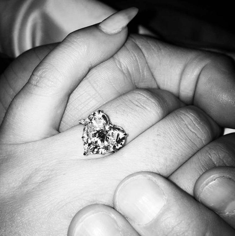 Lady Gaga announced her engagement to the world by sharing this picture of her stunning Lorraine Schwartz heart-shaped white diamond engagement ring, given to her by long-time boyfriend Taylor Kinney on Valentine's day, on her Instagram account. Image: @l
