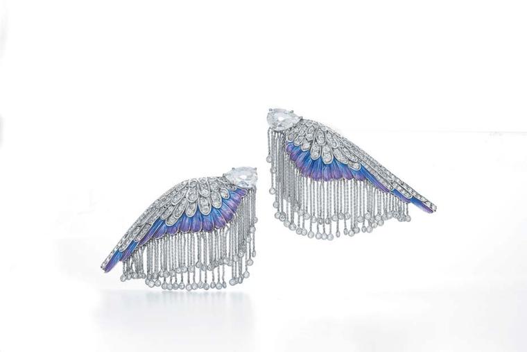Actress Charlize Theron wore this magnificent pair of earrings, re-imagined by Fred Leighton, to the 2014 Met Gala, comprising a pair of antique-cut, pear-shape diamonds, set into antique diamond wings, with ombre enamelled feathers and a white gold and d