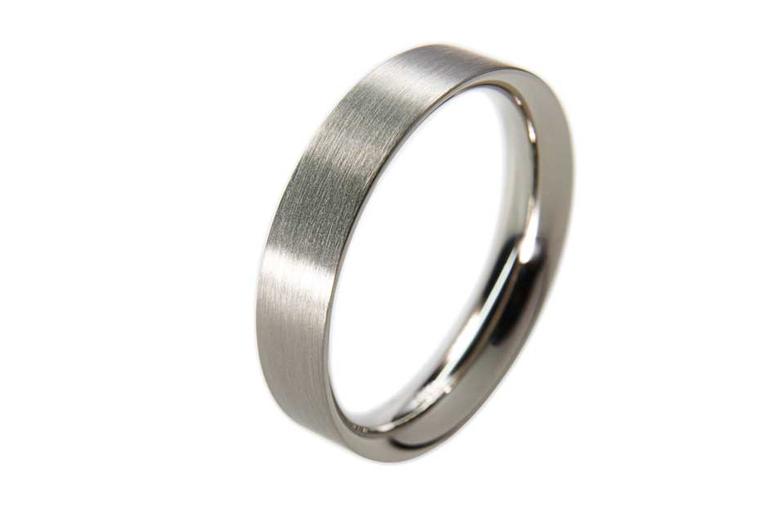 Unity wedding ring in platinum from Cox & Power.