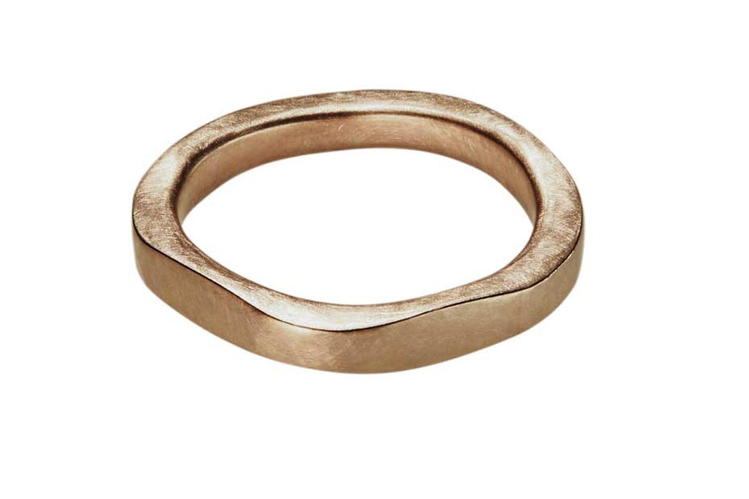 Cox & Power's London forged wedding band in Fairtrade gold.
