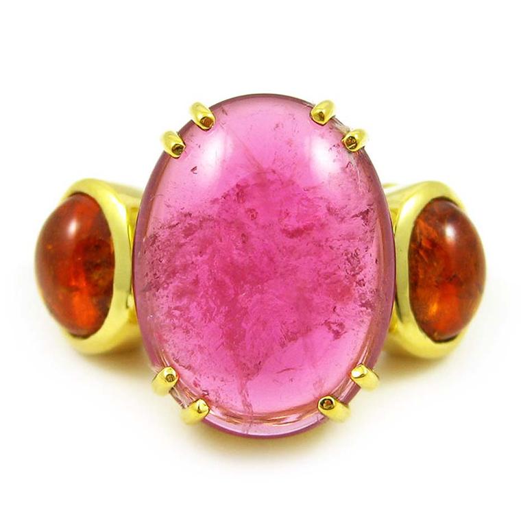 From the Chains of Love collection, the K Brunini Jewels rubellite and mandarin garnet Twig ring in yellow gold is set with a large pink rubellite with a mandarin garnet cabochon on either side. $14,800.