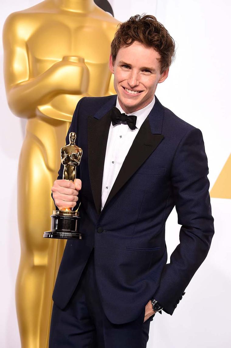 British actor Eddie Redmayne chose to accessorize his bespoke Alexander McQueen suit with a Chopard L.U.C XPS watch in platinum as he collected his Oscar for Best Actor.
