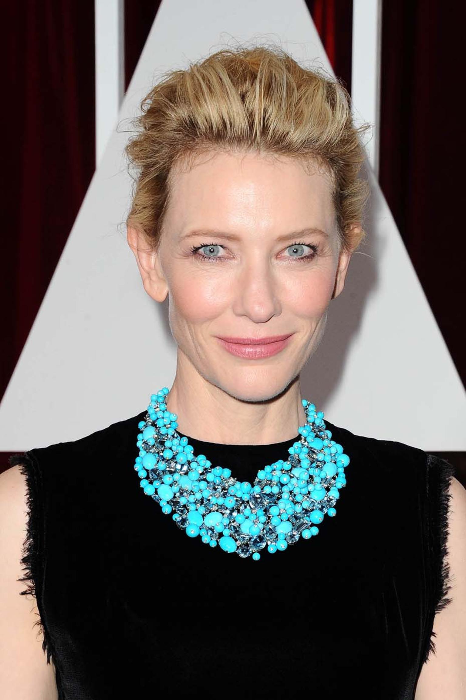 Actress Cate Blanchett's red carpet jewelry made one of the biggest statements of the night. She teamed her black Maison Margiela Couture gown with an outsized Tiffany bib of turquoise, aquamarine and diamonds.
