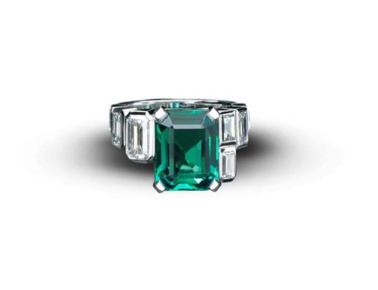Art Deco-style emerald ring from Star Diamond, with a central African emerald weighing 5.90ct, flanked by 2.73ct emerald-cut diamonds in white gold.