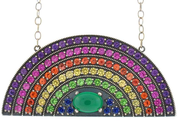 Andrea Fohrman rainbow pendant with stripes of coloured stones arched over a cabochon-cut green onyx. $5,500.
