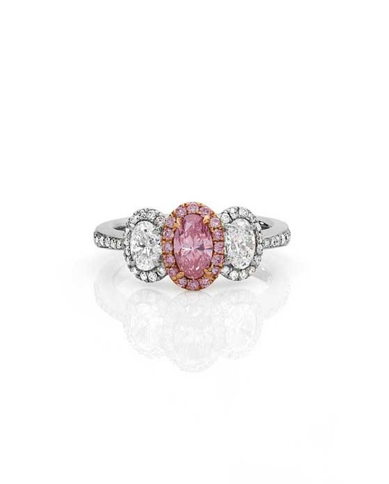 Cerrone Insieme Argyle pink diamond ring in white and rose gold with an oval Argyle pink diamond and oval white diamonds.