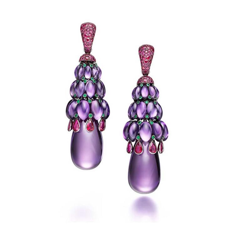 Add a splash of colour with these de GRISOGONO amethyst earrings featuring a large teardrop-cut amethyst, crowned by three tiers of cabochon-cut amethysts and a fringe of pear-cut rubies.