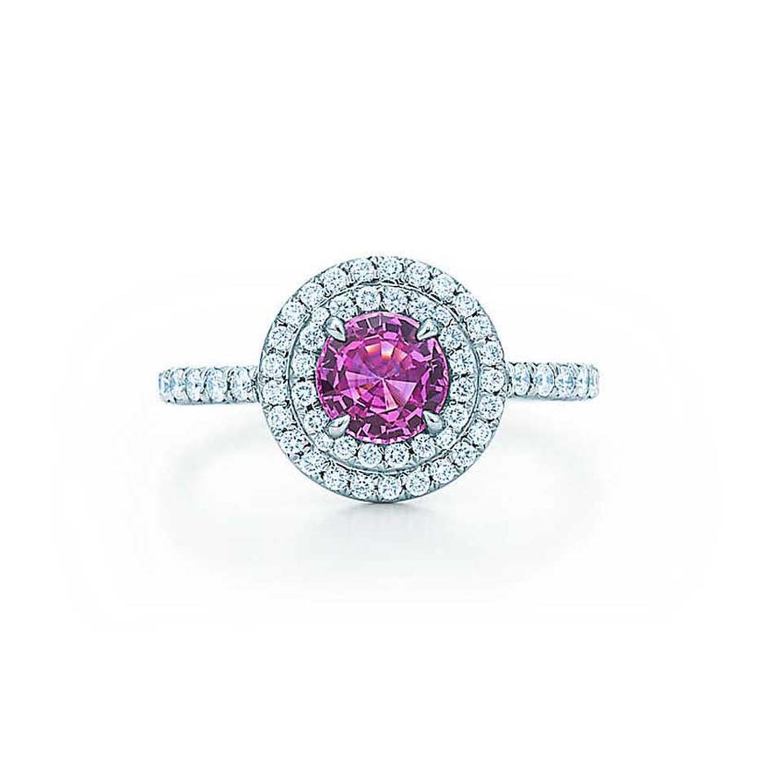 The circular diamond pavé design on this Tiffany pink sapphire engagement ring allows the vibrantly coloured gemstone to take centre stage.