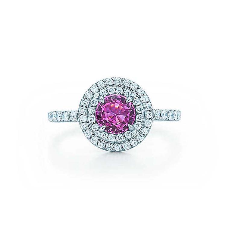 The circular diamond pavé design on this Tiffany pink sapphire engagement ring allows the vibrantly coloured gemstone to take centre stage.