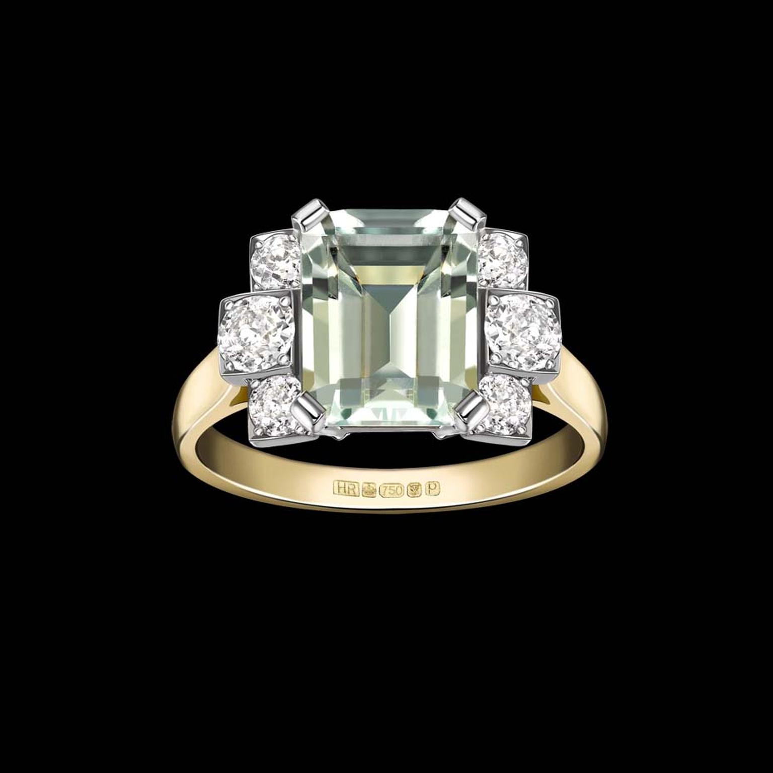 Hattie Rickards ethical engagement ring set with a pale green aquamarine and diamonds in Fairtrade gold.