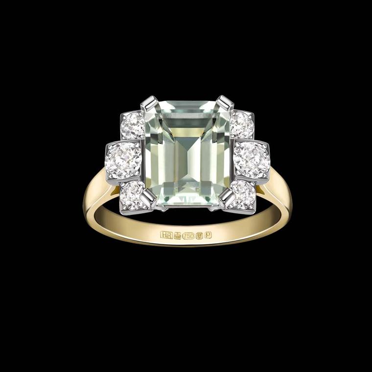 Hattie Rickards ethical engagement ring set with a pale green aquamarine and diamonds in Fairtrade gold.