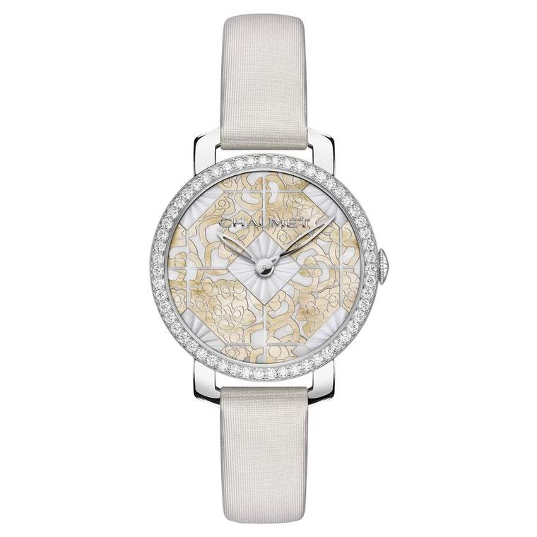 Chaumet Hortensia watch with a 31mm geometric dial, delicately engraved in gold mother-of-pearl and set into the white mother-of-pearl hexagonal shapes in the centre.