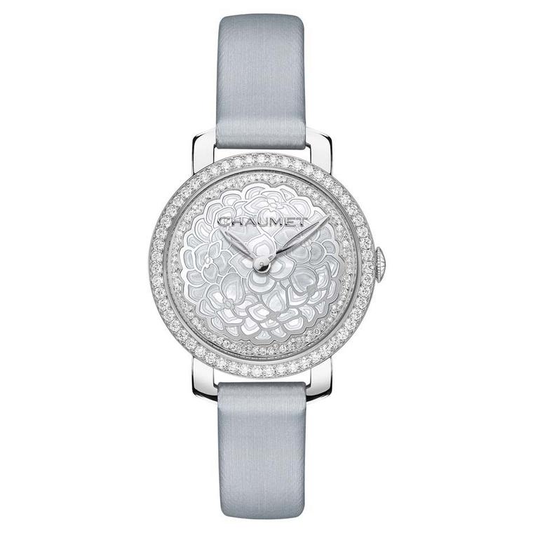 Chaumet Hortensia ladies' watch with a blue mother-of-pearl dial and a white gold case set alight with 195 brilliant-cut diamonds.