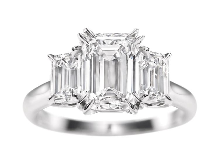 Harry Winston three stone emerald-cut engagement ring.