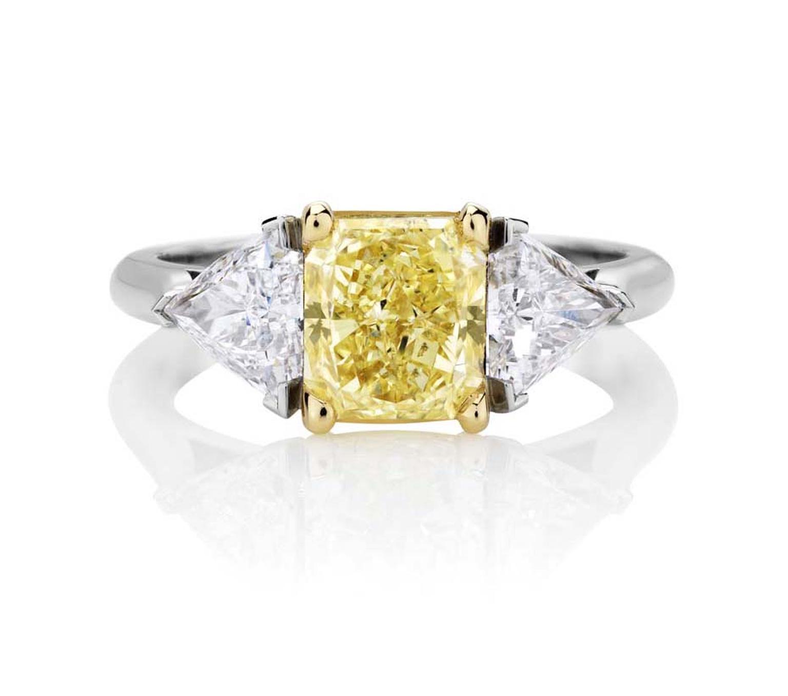 Part of De Beers jewellery’s 1888 Master Diamonds collection, this one-of-a-kind three stone engagement ring is set with a 3.93ct Vivid yellow diamond flanked by trilliant-cut diamonds.
