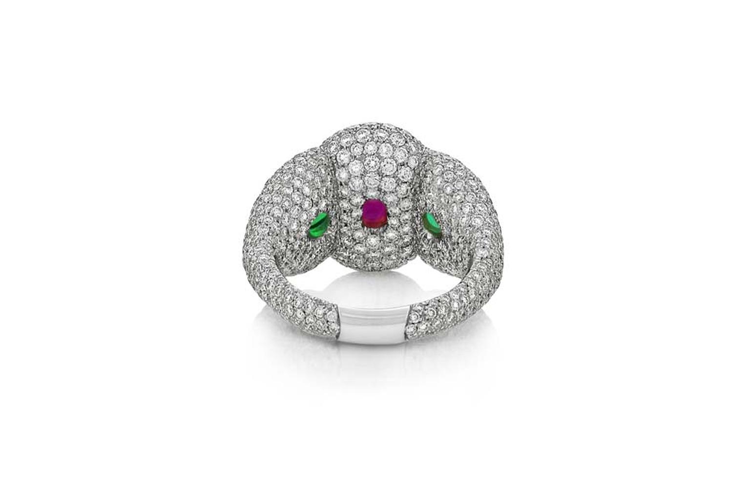 The African ruby and emeralds peep through when viewed from behind in Niquesa's Rose of the Desert ring.