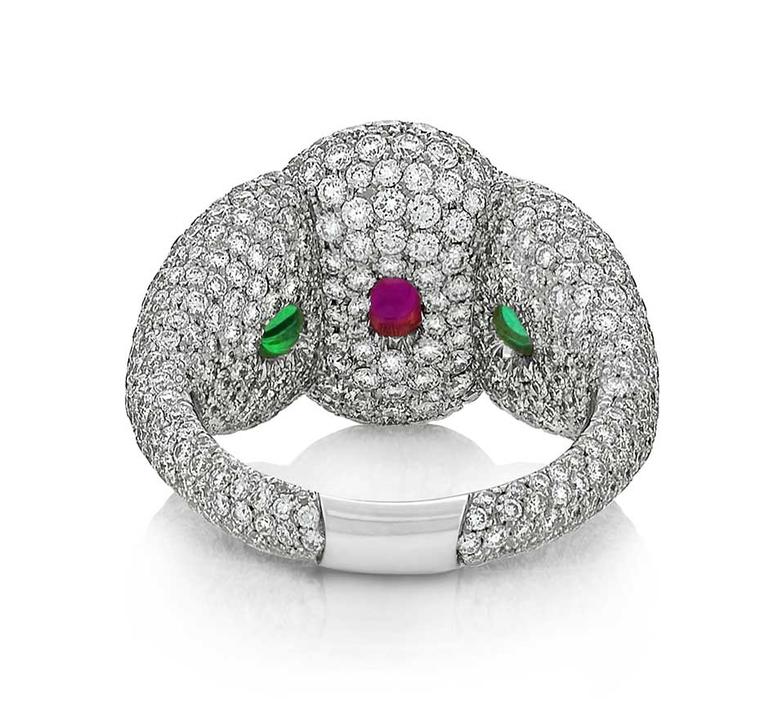 The African ruby and emeralds peep through when viewed from behind in Niquesa's Rose of the Desert ring.