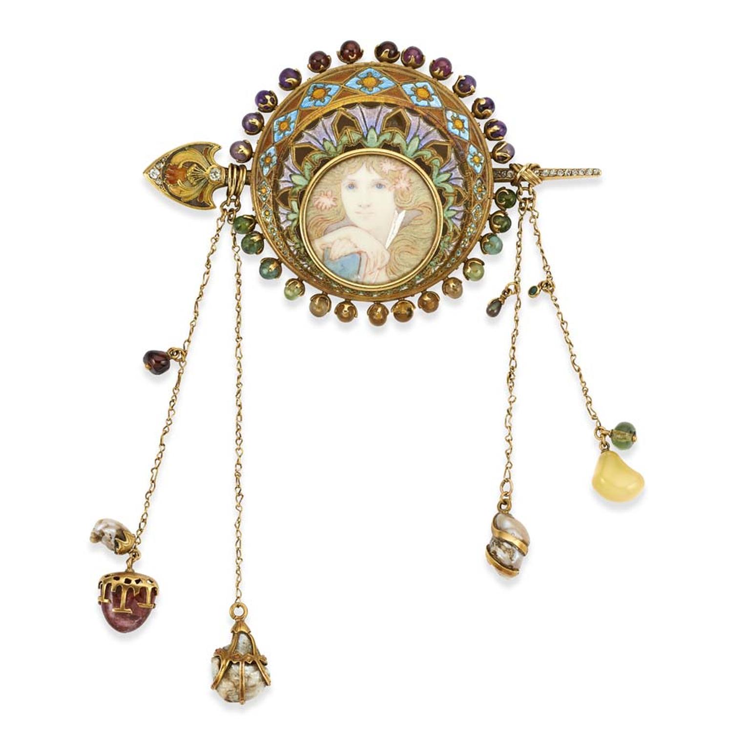 Gold corsage designed by the painter Alphonse Mucha and crafted by the French jeweller George Fouquet. Offered for sale at TEFAF by British antique dealers Wartski.