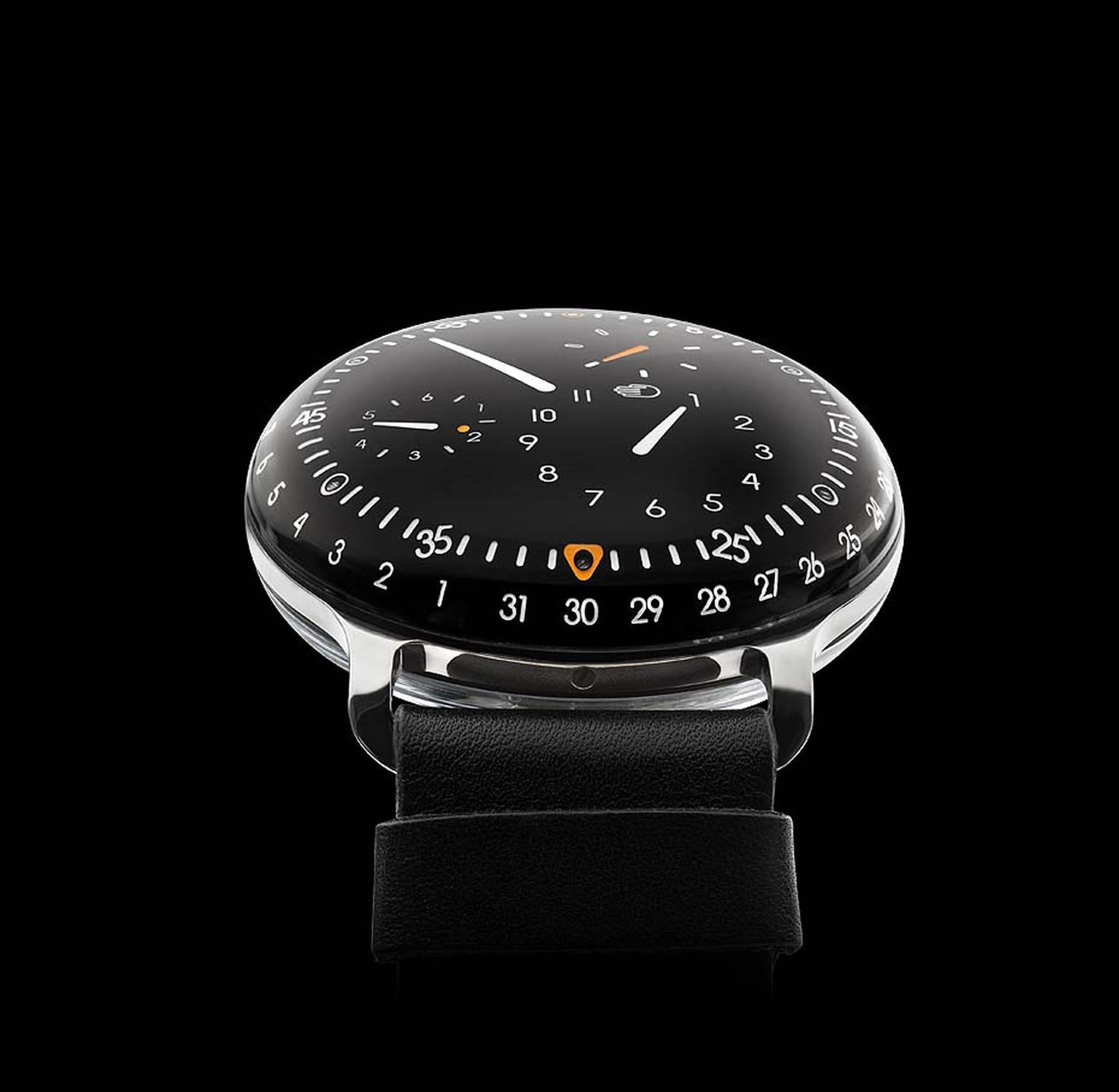 The Ressence Type 3 watch literally sees time floating under a bubble that curves up towards the viewer with its clear symbols marking the hours, minutes, seconds, days and date without the aid of hands or a crown.