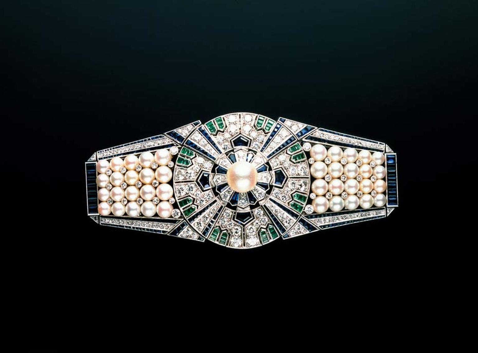 Mikimoto's multi-functional Yagurama sash pin, created and shown at a Paris Expo in 1937. Image courtesy of Mikimoto Pearl Island Co.