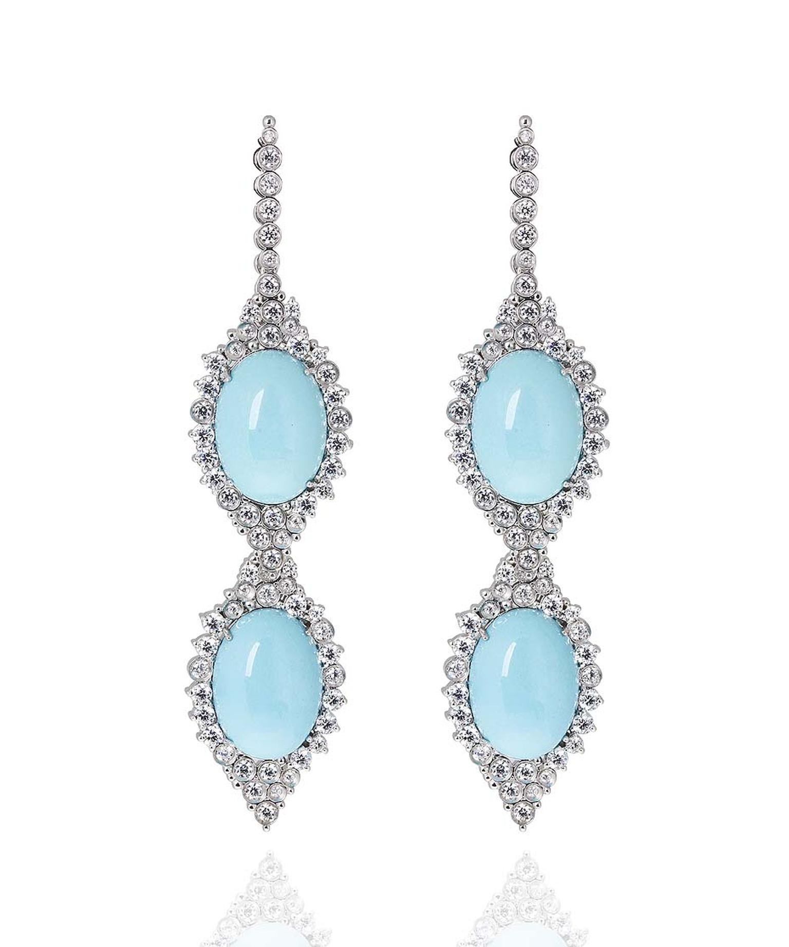 Carla Amorim earrings set with rare Sleeping Beauty turquoise in white gold, accentuated by brilliant-cut diamonds.