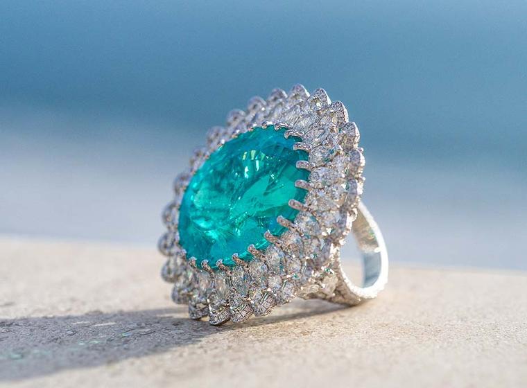 Chopard ring in white gold from the 2015 Haute Joaillerie collection featuring a lacework ribbon of diamonds surrounding by a 41.57ct Paraiba tourmaline.