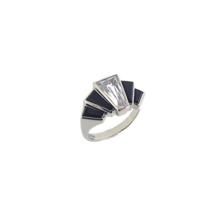 Art Deco-style engagement ring from Baroque Jewellery in white gold set with a tapered baguette-cut white sapphire and black onyx shoulders.