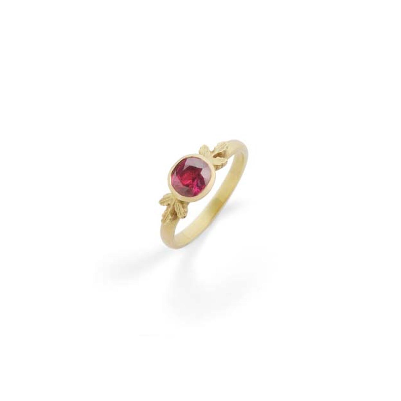 Beth Gilmour ruby unique engagement ring with a yellow gold band featuring the designer’s signature oak leaf motif.