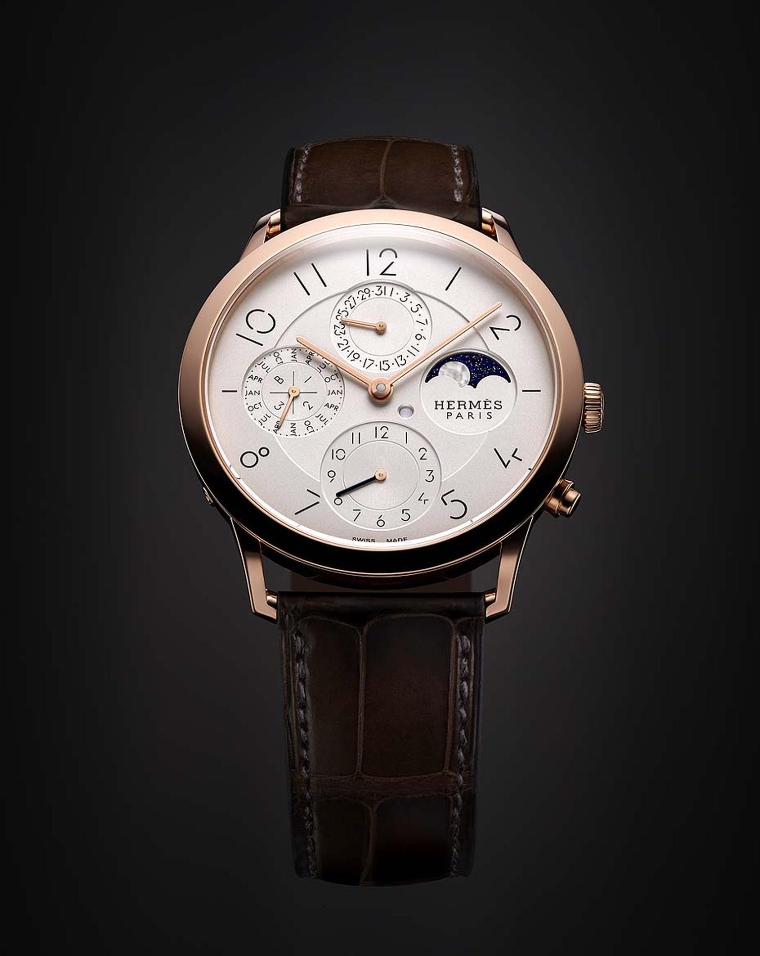 The elegant new Slim d'Hermès collection includes a perpetual calendar men's watch and a Moon phase function in milky mother-of-pearl set against an aventurine glass sky.