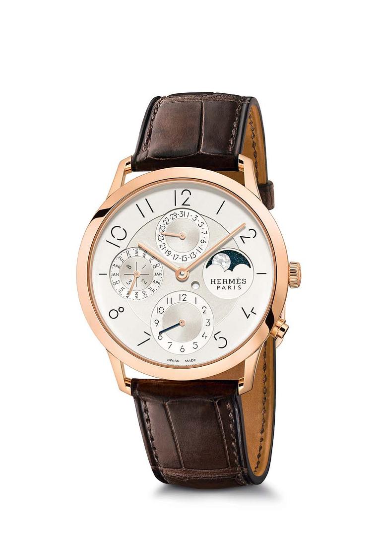 New Slim d'Hermès men's watch collection features a distinctive typography of the numerals. The new ultra-thin automatic movement, measuring just 2.6mm, lends a lean profile to the 39.5mm rose gold case.
