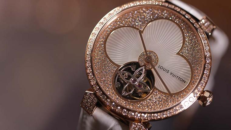 The Tambour Monogram Sun Tourbillon is the season's showstopper, featuring a tourbillon at its heart and an etched mother-of-pearl Monogram flower surrounded by snow-set diamonds.