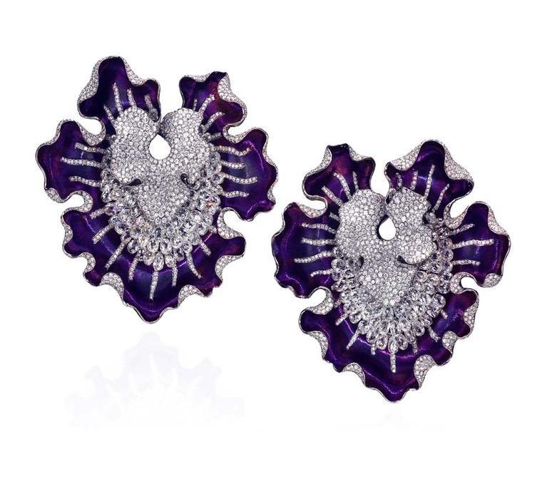 The Anna Hu Myth of Orchid high jewellery earrings worn by Hilary Swank to the 2011 Oscars in purple titanium, set with briolette, silver-grey and white diamonds.