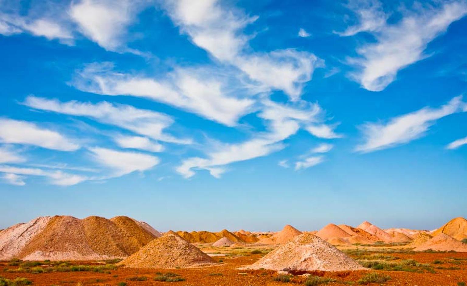 Mullock Heaps, the leftover residual dirt from the opal mining process, which may contain small pieces of opal fragments that were missed by the miners, is a popular spot for locals and tourists. Photo: Courtesy of South Cape Photography / District Counci