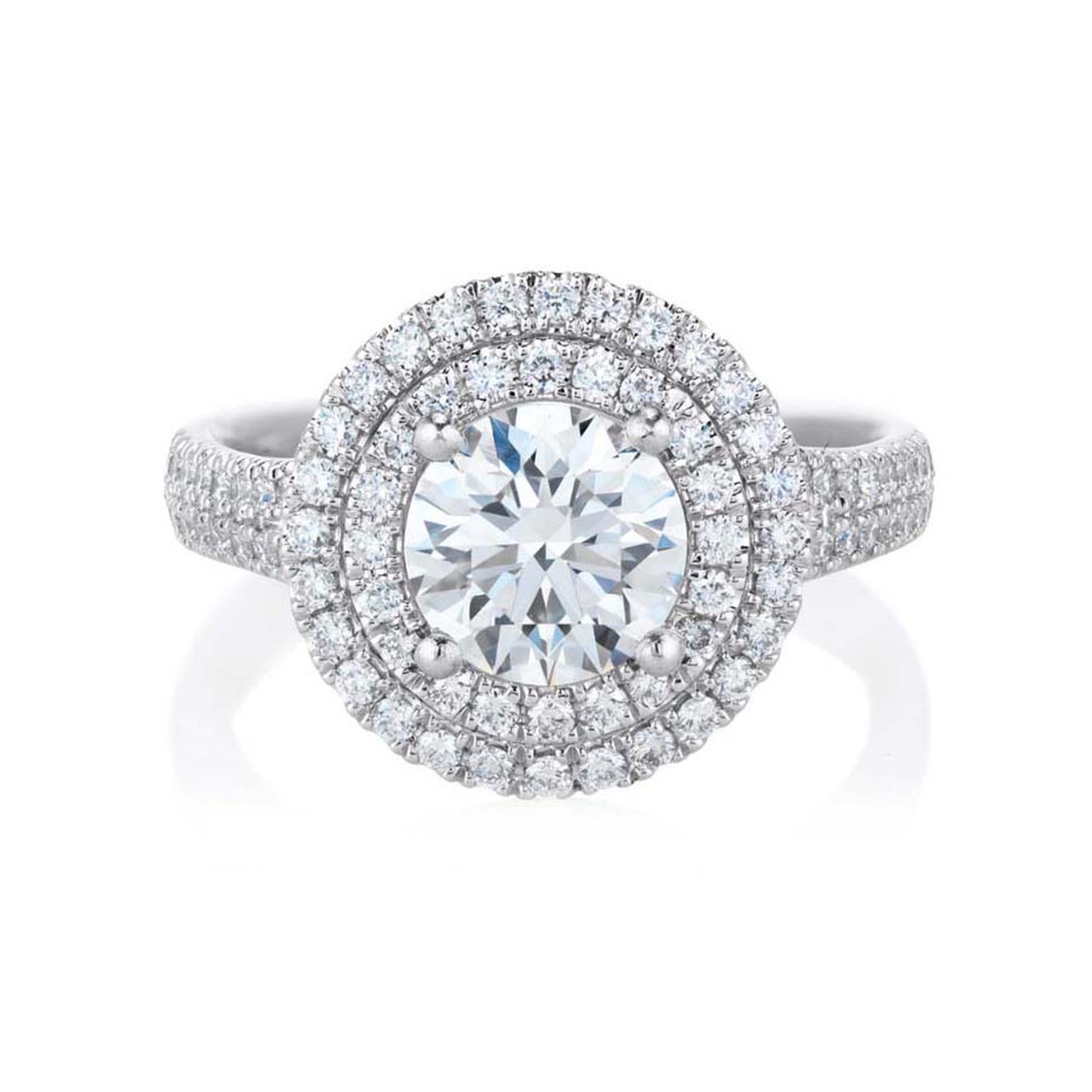 De Beers Aura Double Halo ring in platinum, set with a central round, brilliant-cut diamond and micro pavé diamonds.