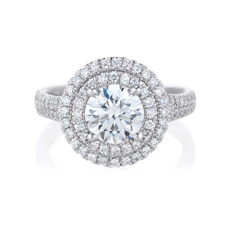 De Beers Aura Double Halo ring in platinum, set with a central round, brilliant-cut diamond and micro pavé diamonds.