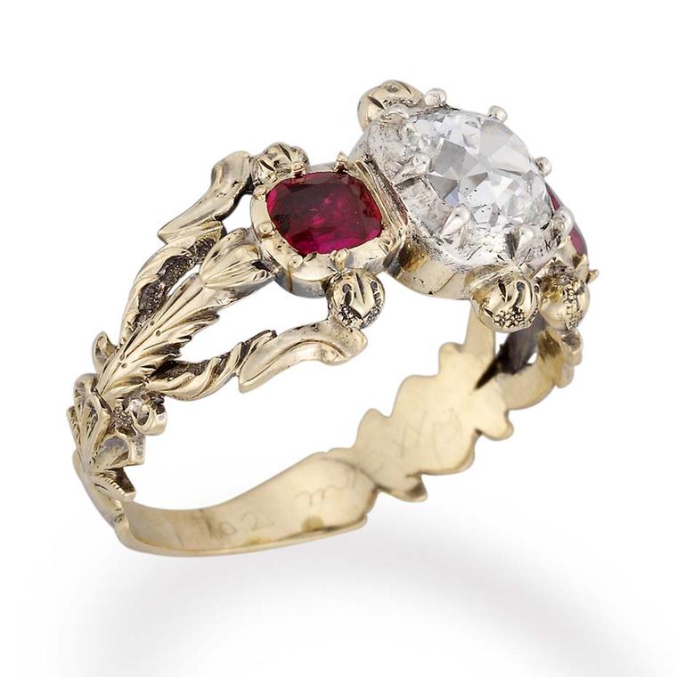 A side view of Bentley & Skinner's diamond and ruby Victorian engagement ring, circa 1850.