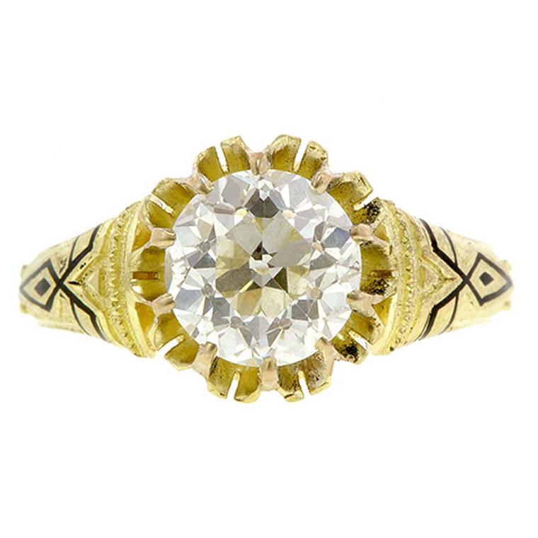 Victorian engagement ring in gold, with an old European-cut diamond and black enamel detail, available from Doyle & Doyle in New York.