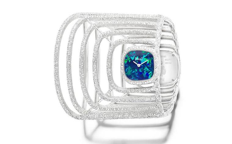 Extremely Piaget watch cuff in white gold with diamonds and an opal dial.