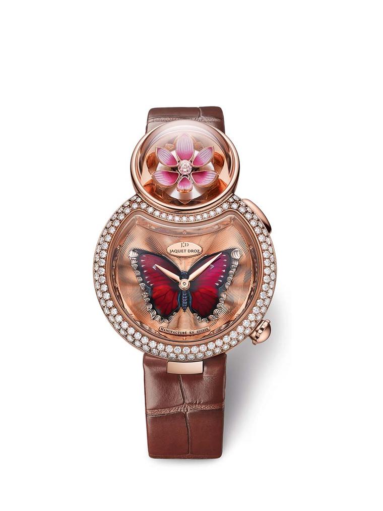 Jaquet Droz Lady 8 Flower watch features an in-built automaton device. By activating the pusher on the side of the case, the lotus flower magically opens its petals.