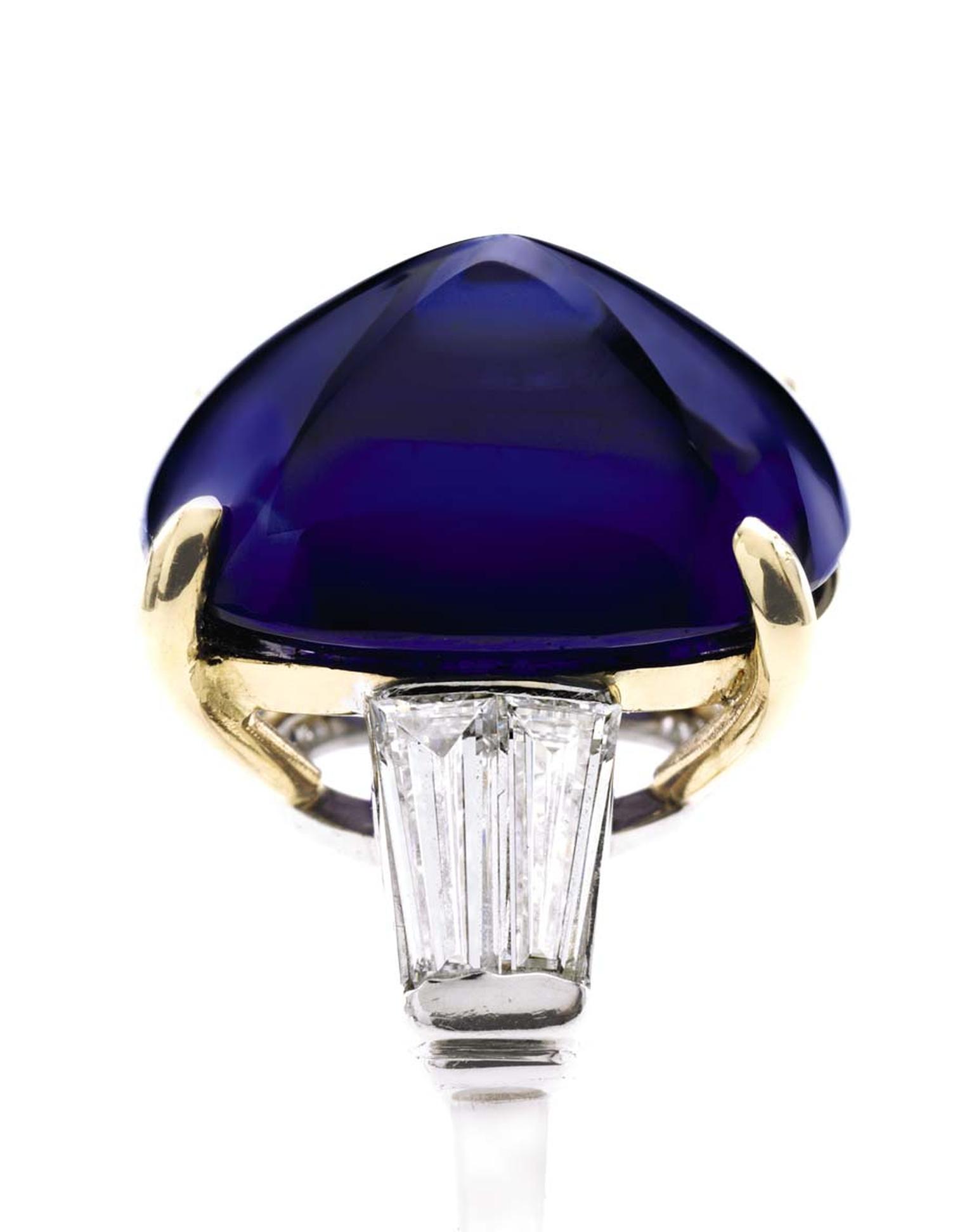 Important platinum and gold ring set with a 9.94ct sugarloaf cabochon sapphire, accompanied by diamonds on each shoulder (estimate: $700,000-$1 million).